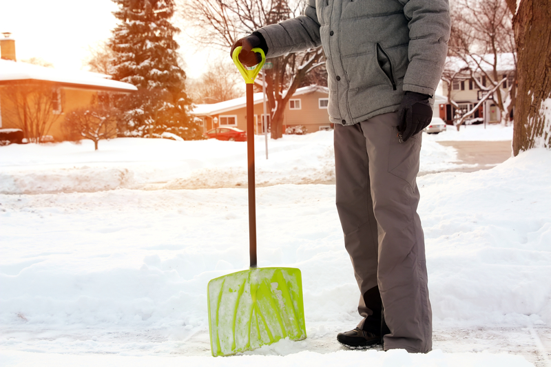 Snow Shoveling Tips to Avoid Injury